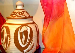 Burial urn and prayer shawl