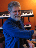 John Morris at the keyboard