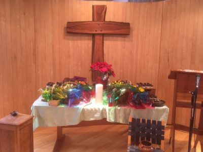 The altar-table filled with flowers on Easter Sunday